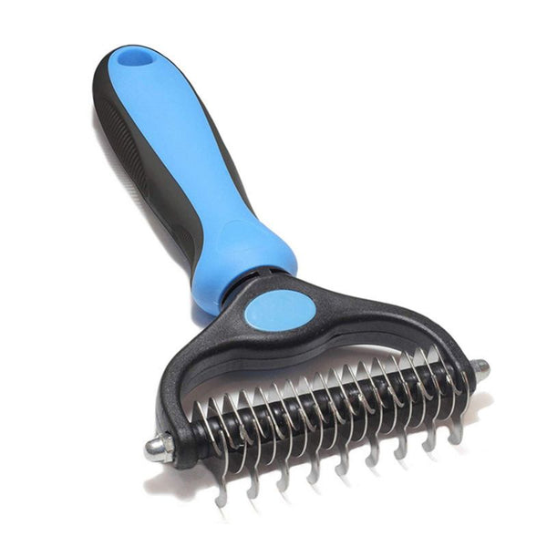 Brosse de démêlage pour Chien vue de près avec manche ergonomique bleu et noir