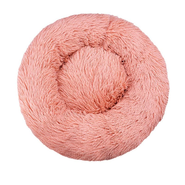 Panier Donut moelleux pour chien couleur rose pastel.