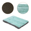 Coussin orthopédique pour chien vert avec zoom sur tissu et base antidérapante.