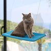 Hamac de Fenêtre Pour Chat en bleu turquoise avec un chat gris assis en équilibre - Toutou Love