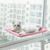 Hamac de Fenêtre Pour Chat en rose avec un chat blanc regardant vers l’objectif - Toutou Love
